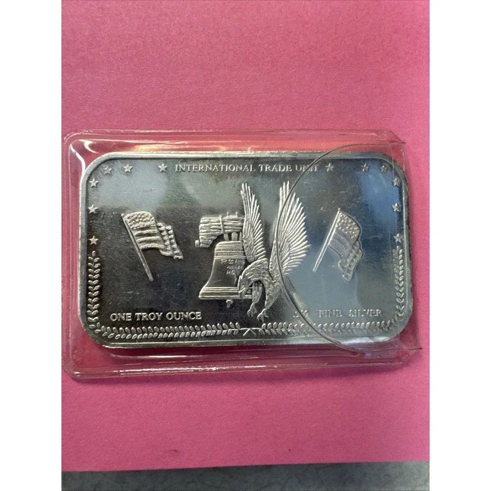 INTERNATIONAL TRADE UNIT LIBERTY BELL FLAGS EAGLE 1 TROY OZ .999 FINE SILVER BAR